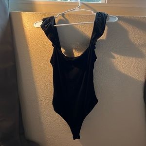 LULUS black body suit with flared sleeves. size medium.